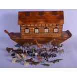 A LARGE EARLY 20TH CENTURY FOLK ART PAINTED WOOD NOAHS ARK together with painted animals. Boat 60 cm