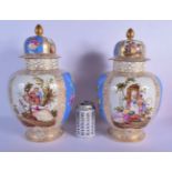 A LARGE PAIR OF 19TH CENTURY GERMAN AUGUSTUS REX VASES AND COVERS painted with lovers. 37 cm x 18 cm