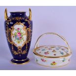 EARLY 2OTH C. MINTON TWO HANDLED VASE PAINTED WITH FLOWERS ON BOTH SIDES ON A GILT AND COBALT BLUE G