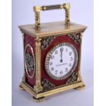 A CONTINENTAL SILVER GILT AND ENAMEL CLOCK within a fitted box. 489 grams. 9.75 cm x 6.5 cm x 4 cm i