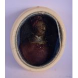 A RARE 18TH CENTURY EUROPEAN IVORY CASED WAX PORTRAIT MINIATURE depicting a male in Tudor clothing.