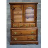 A Young and Hunkle Shenandoa pine linen press with Louvre doors on a three drawer Chest 153 x 93 x .