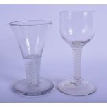 TWO GEORGE III WHITE TWIST STEM GLASSES. Largest 13 cm high. (2)