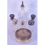 A collection of glass bottles and jugs with plated lids largest 23cm (7).