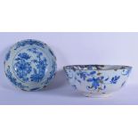 A LARGE 18TH CENTURY DELFT BLUE AND WHITE BOWL together with a similar shallow dish. Largest 22 cm x