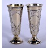 A PAIR OF ANTIQUE RUSSIAN SILVER TOTS. 54 grams. 7.25 cm high.