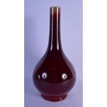 A LARGE 19TH CENTURY CHINESE OX BLOOD FLAMBE GLAZED BULBOUS VASE Qing, with straight neck. 38 cm hig