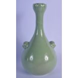 A 19TH CENTURY CHINESE CELADON BULBOUS VASE bearing Yongzheng marks to base, with mask head handles.