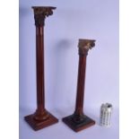 TWO UNUSUAL EARLY VICTORIAN CARVED MAHOGANY PEDESTAL COLUMNS formed with scrolling acanthus. Largest