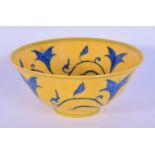 A Chinese porcelain yellow ground bowl decorated with foliage 7 x 15cm.