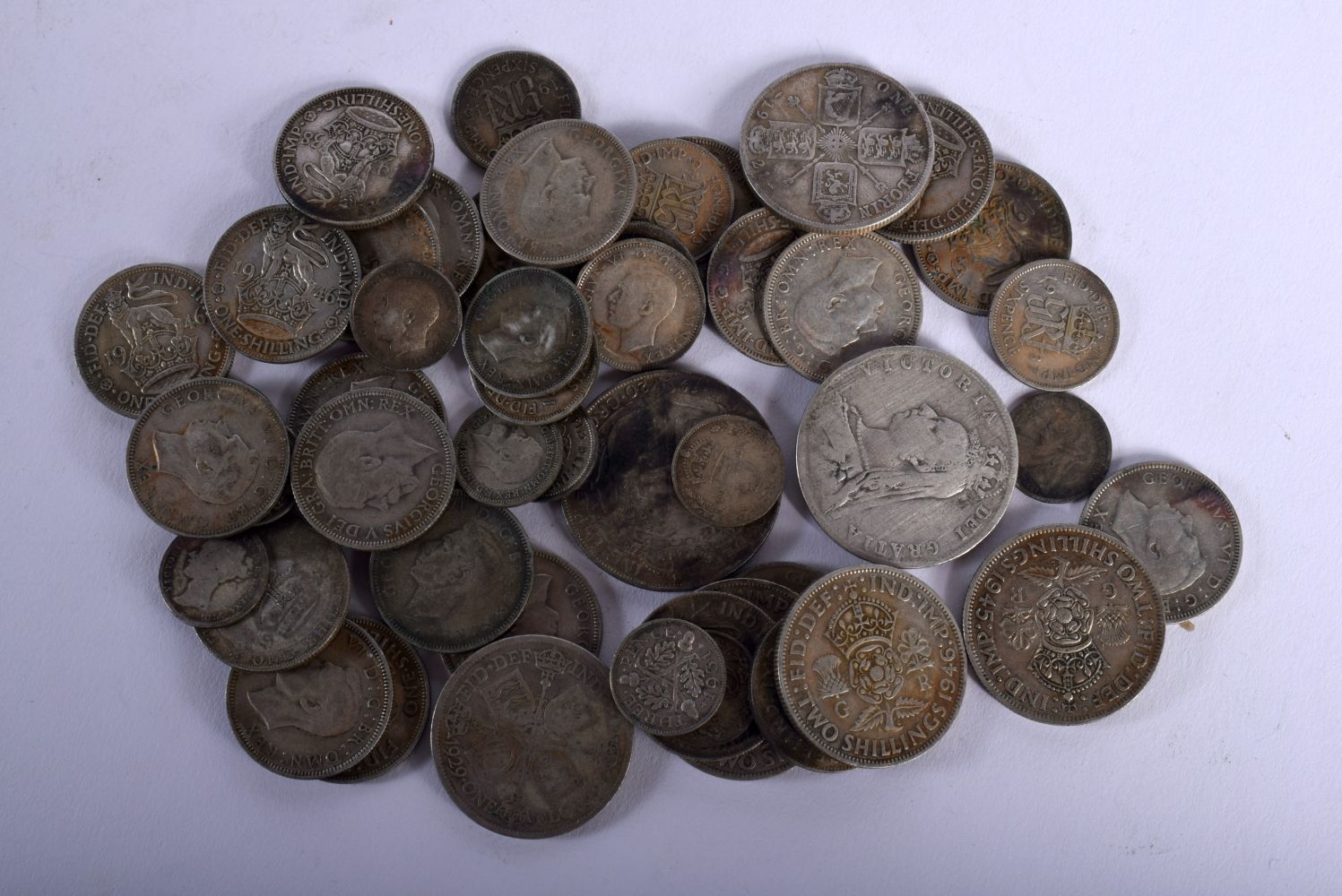 A QUANTITY OF BRITISH SILVER COINS. Weight 258g (qty)