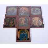 A collection of antique Punch and Judy magic lantern slides 8 x 8 cm (7).