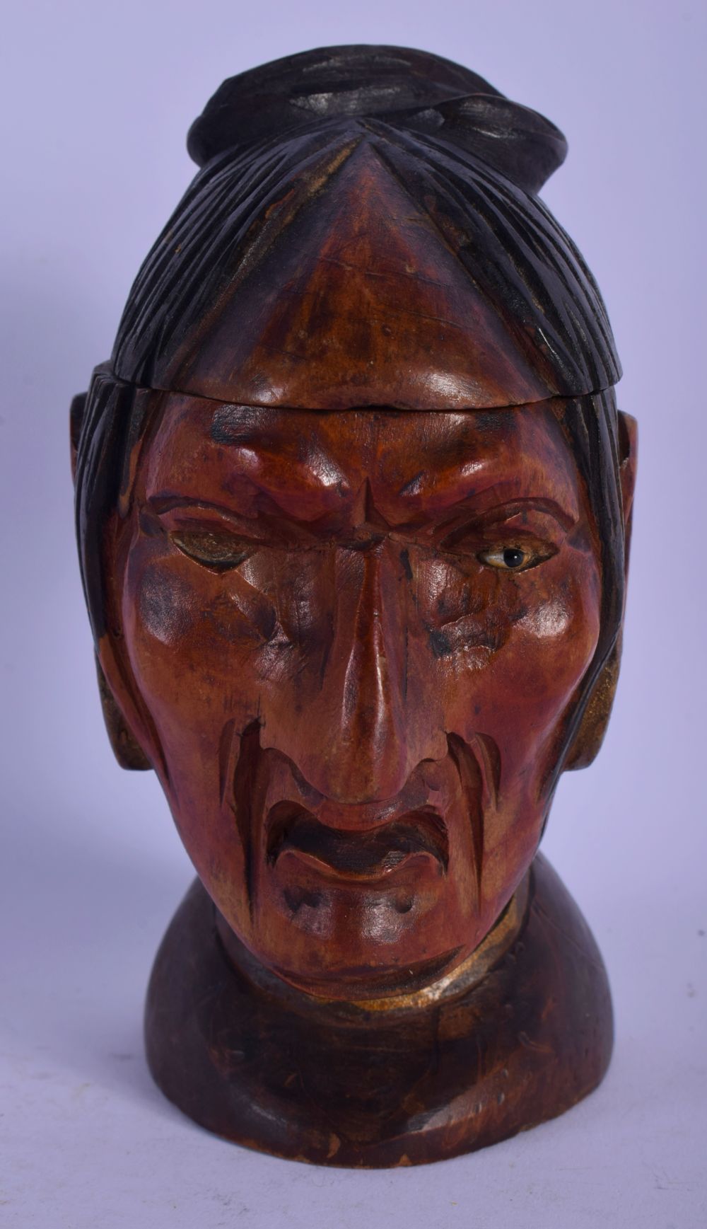 A RARE 19TH CENTURY EUROPEAN CARVED AND PAINTED WOOD INKWELL in the form of a South American tribal