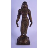A GOOD 18TH CENTURY INDIAN BRONZE FIGURE OF A STANDING BUDDHIST DEITY modelled with her hands by her