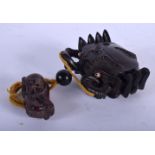 A JAPANESE WOODEN INRO SHAPED LIKE A CRAB WITH A SQUID TOGGLE. 6.7cm x 8cm x 3.2cm, weight 85g