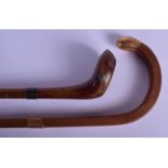AN ANTIQUE CARVED WOOD GOLF CLUB SUNDAY STICK together with a 9ct gold mounted cane. Largest 88 cm l