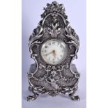 A FINE LATE 19TH CENTURY EUROPEAN NEO CLASSICAL TRAVELLING CLOCK decorated with cupid and foliage. 2