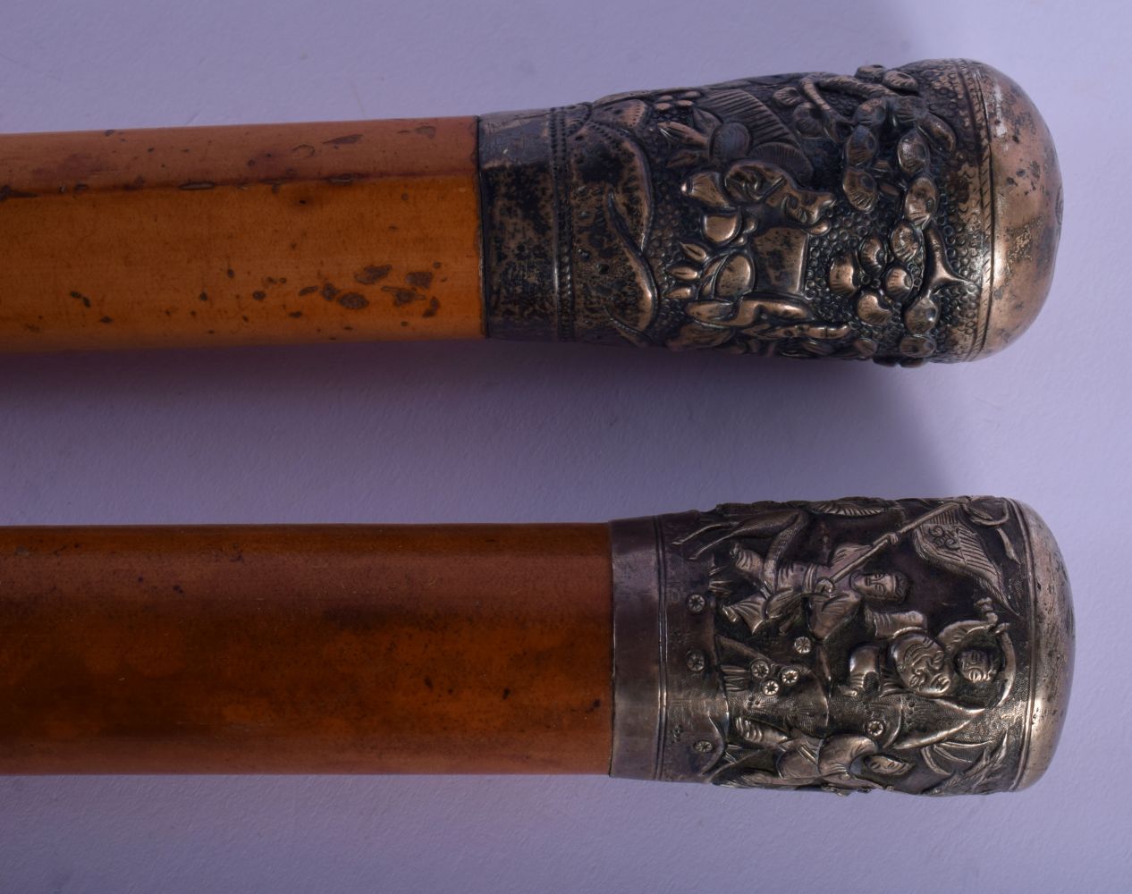 TWO 19TH CENTURY INDIAN SILVER MOUNTED WALKING CANES. Largest 90 cm long. (1) - Image 2 of 3