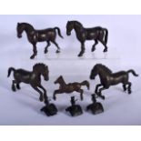 FOUR CHINESE BRONZE HORSES 20th Century, with three riders. Largest 12 cm x 9 cm. (7)