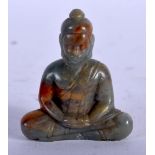 A CARVED JADE FIGURE OF A SEATED GOD. 3.4cm x 2.8cm, weight 9.4g