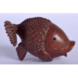 A JAPANESE CARVED WOOD FISH. 5.3cm x 7.6cm, weight 41.7g