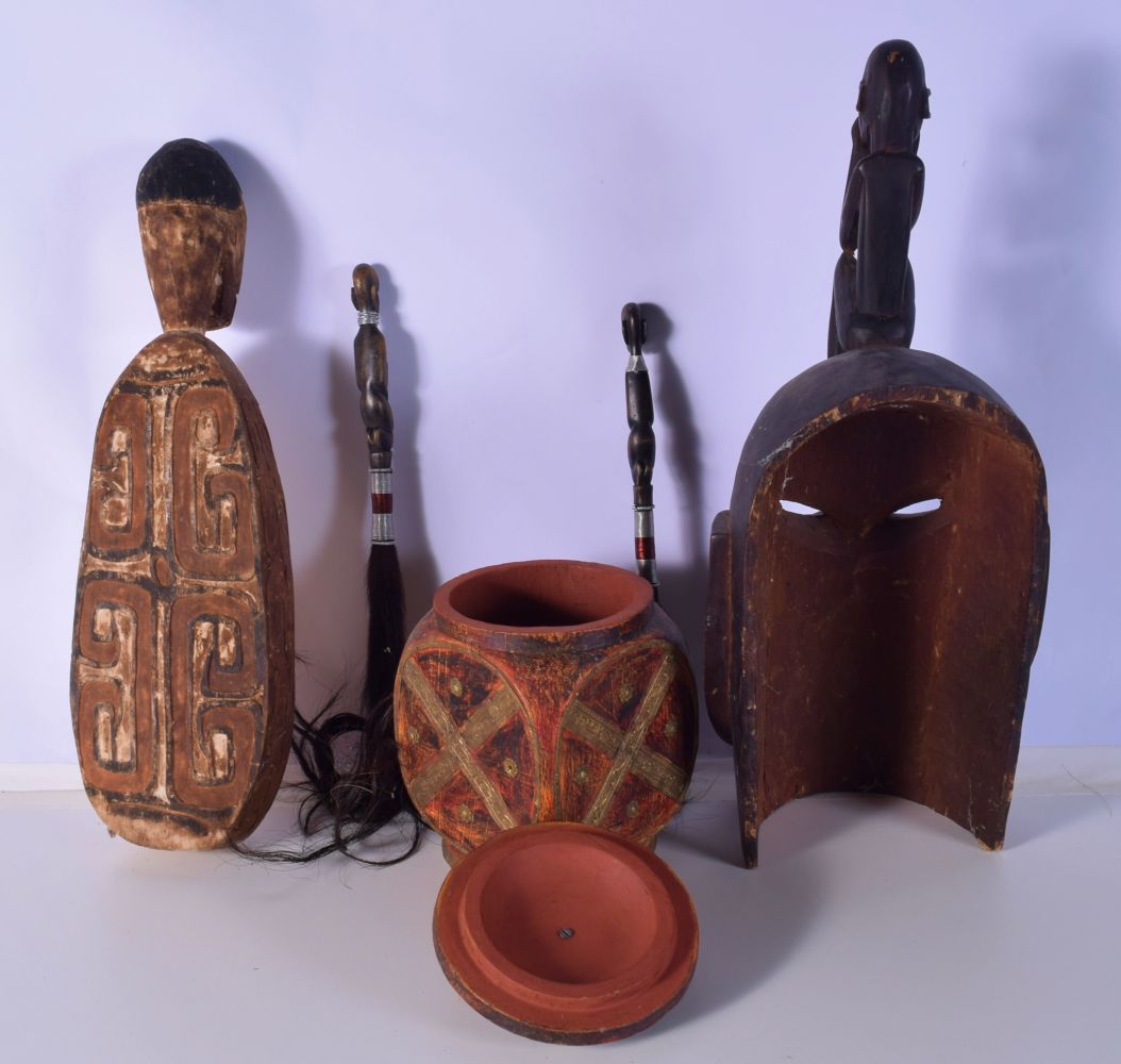 A collection of Tribal items including a feeding bowl, Yoruba mask, fly swats and a middle Eastern p - Image 2 of 6