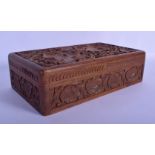 AN EARLY 20TH CENTURY INDIAN CARVED HARDWOOD RECTANGULAR BOX decorated with leaves. 24 cm x 14 cm.