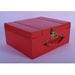 A VINTAGE DUNHILL RED LEATHER TRAVELLING VANITY CASE. 27 cm x 12 cm closed.