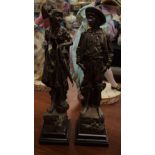 A PAIR OF 19TH CENTURY EUROPEAN SILVERED BRONZE FIGURES modelled as a male and female. 51 cm high.