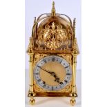 A brass lantern clock 39 x 20 x 20cm .