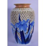 AN EARLY 20TH CENTURY JAPANESE MEIJI PERIOD RETICULATED VASE painted with blue foliage. 19 cm high.