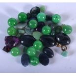 A QUANTITY OF LOOSE BEADS AND STONES. Largest 1.7cm x 1.2cm, weight 38.2g