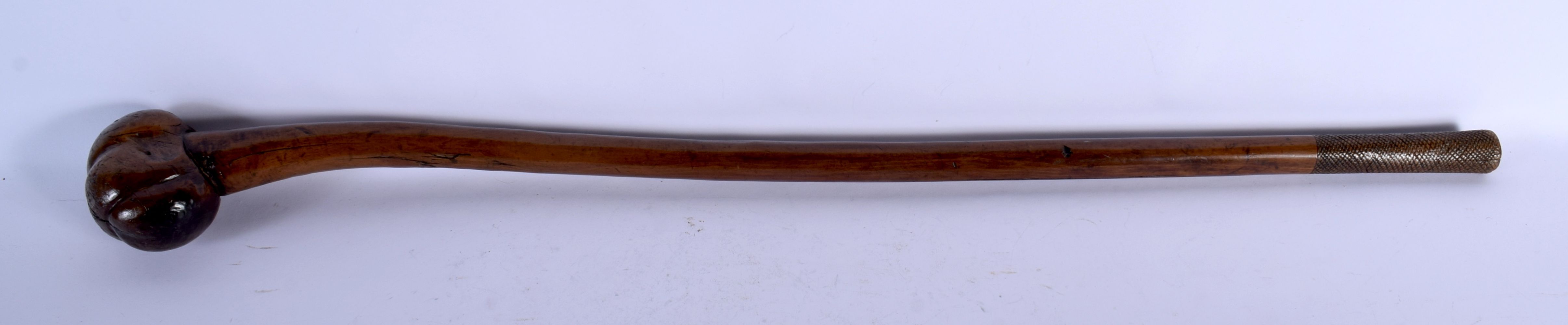 A 19TH CENTURY POLYNESIAN TRIBAL HARDWOOD THROWING CLUB. 77 cm long.