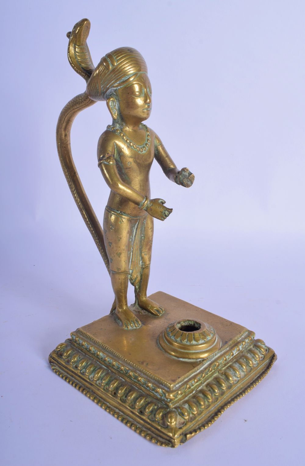 A CHARMING EARLY 19TH CENTURY INDIAN BRONZE FIGURE OF A BOY modelled with a serpent upon a square pl - Image 4 of 7