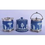 THREE WEDGWOOD JASPERWARE BISCUIT BARRELS. Largest 17 cm x 12 cm. (3)