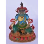 A Tibetan enamelled glass buddha 10 cm.