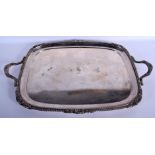 A LARGE 19TH CENTURY TWIN HANDLED SILVER PLATED TRAY by Goldsmiths of London. 65 cm x 40 cm.