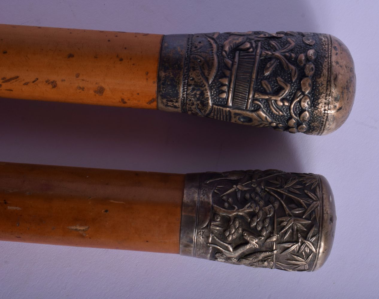 TWO 19TH CENTURY INDIAN SILVER MOUNTED WALKING CANES. Largest 90 cm long. (1)