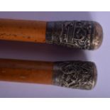 TWO 19TH CENTURY INDIAN SILVER MOUNTED WALKING CANES. Largest 90 cm long. (1)