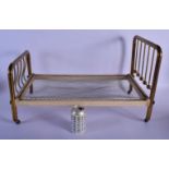 A LOVELY EDWARDIAN BRASS MINIATURE TESTER BED possibly or a doll or an apprentice salesman sample. 6