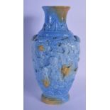 A 19TH CENTURY CHINESE CLARE DE LUNE PORCELAIN VASE Qing, relief moulded with buddhistic lions among