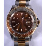 A GENTLEMANS GMT SEAMASTER ROLEX, with a root beer dial. 4.5cm diameter including crown.