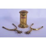 AN ANTIQUE BRASS AND COPPER POST BOX MONEY BANK together with a pair of spurs. Largest 15 cm x 9 cm.