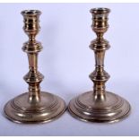 A PAIR OF SILVER CANDLESTICKS. 640 grams loaded. 17 cm high.