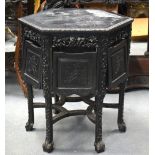A 19TH CENTURY CHINESE HEXAGONAL HARDWOOD TABLE WITH CARVED FREIZE. 67cm x 62cm