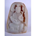 A JADE BOULDER CARVED AS A SEATED DEITY. 8.6cm x 6.1cm, weight 207.6g
