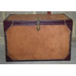 A leather Trunk with suede lining 50 x 77 x 49cm.