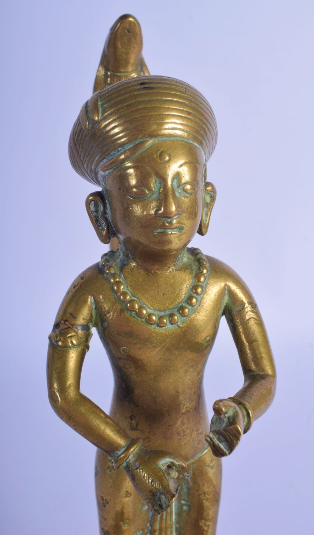 A CHARMING EARLY 19TH CENTURY INDIAN BRONZE FIGURE OF A BOY modelled with a serpent upon a square pl - Image 5 of 7