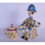 A 19TH CENTURY FRENCH FAIENCE FIGURAL DOUBLE SALT together with a French custard cup and cover. Larg