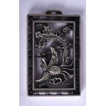 A CHINESE PENDANT DECORATED WITH A MYTHICAL BIRD. 6.1cm x 3.9cm, weight 34.9g